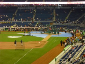 View of the home plate/dugout box area, notice the partitions above the first few rows