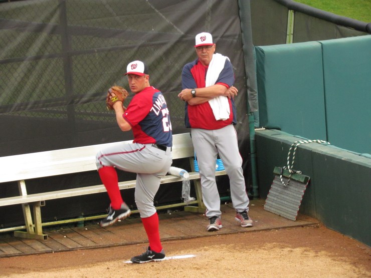 Jordan Zimmerman throwing with Steve McCatty looking on