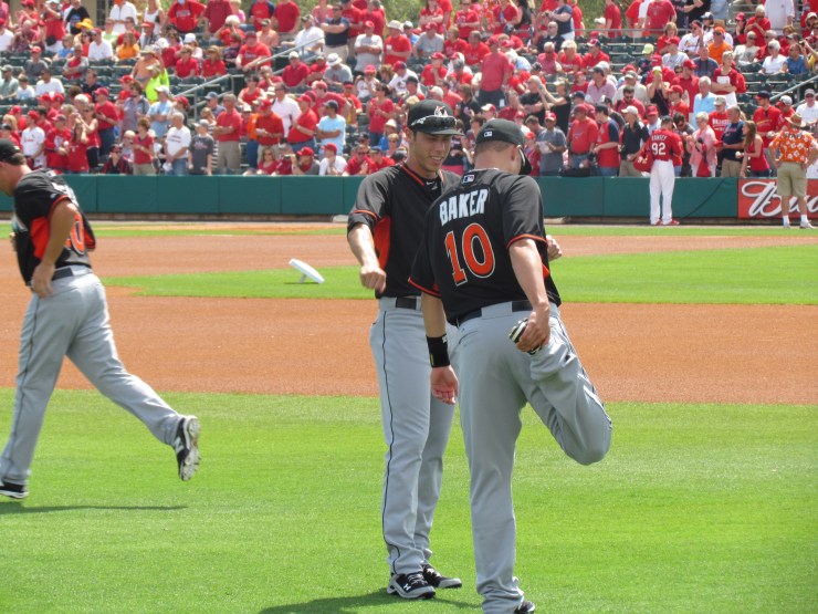 Christian Yelich and Jeff Baker
