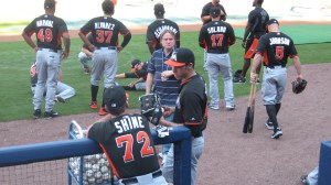 Marlins players outside dugout